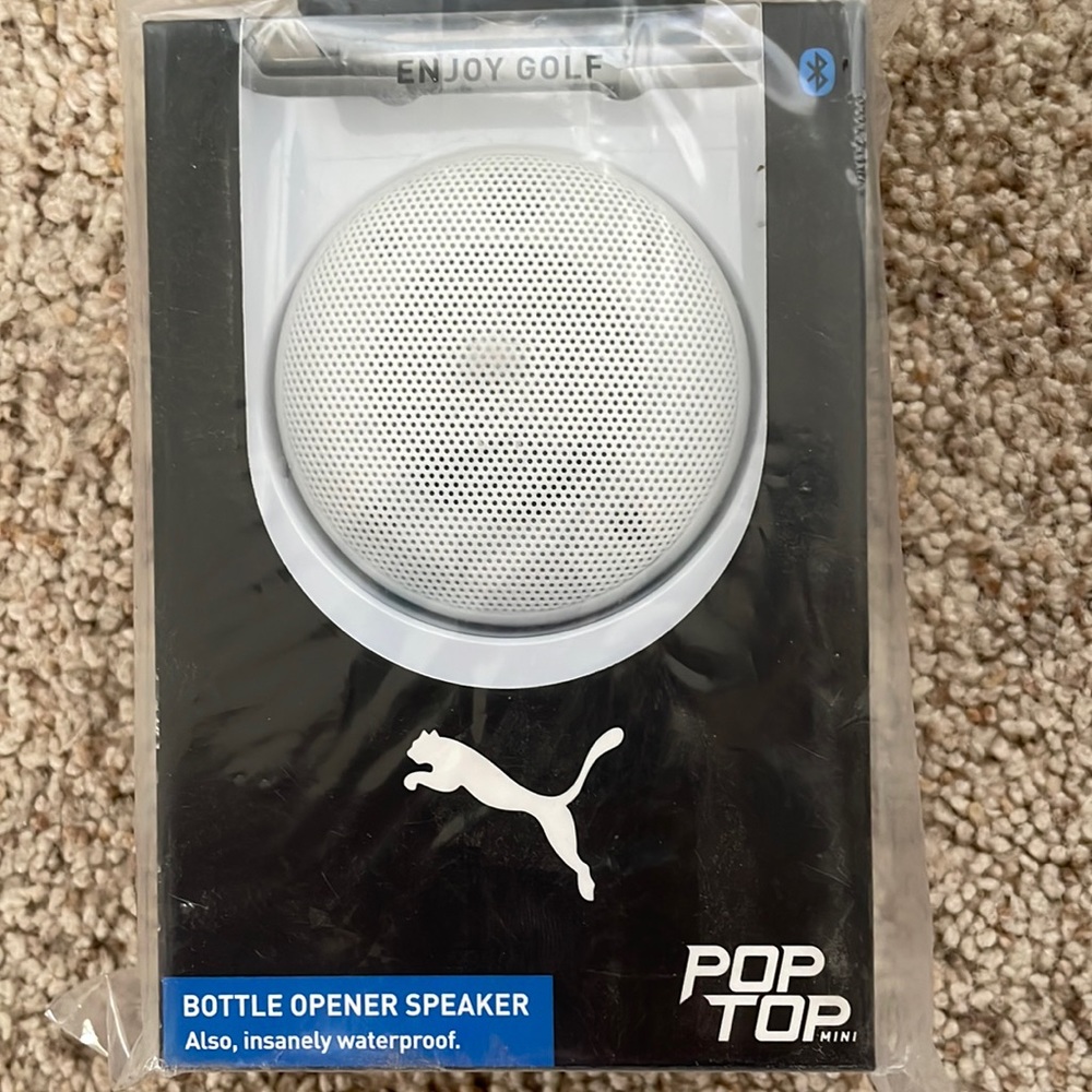 Poptop bottle opener speaker, Puma, new in package.  Great for the golf course